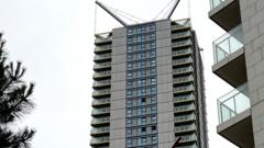 Child among three dead in tower block fall